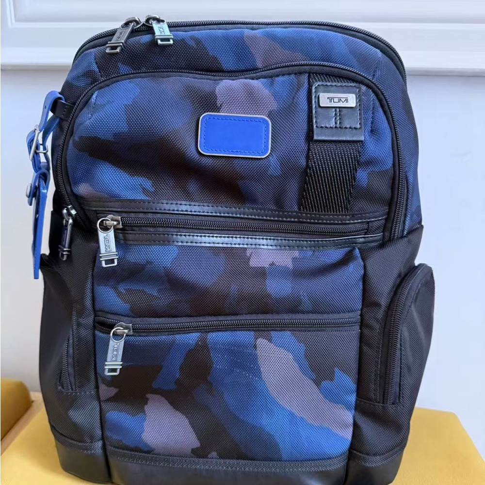 Tumi Blue and Black Backpack Sleek Durable Design